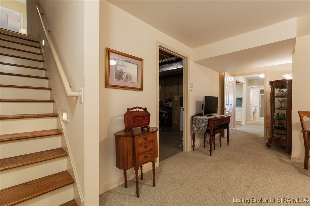 2001 Spring Creek Drive Floyds Knobs, IN 47119 - Photo 26 of 63 Stair with wood treads leading to lower finished l