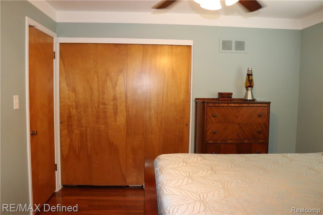 17342 Rougeway Street Livonia, MI 48152 - Photo 7 of 18 Large closet in Master bedroom and ceiling fan.