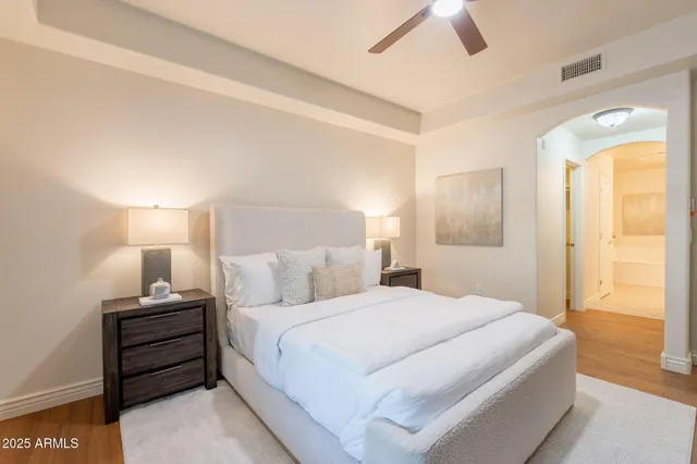 a bedroom with a bed and a walk in closet