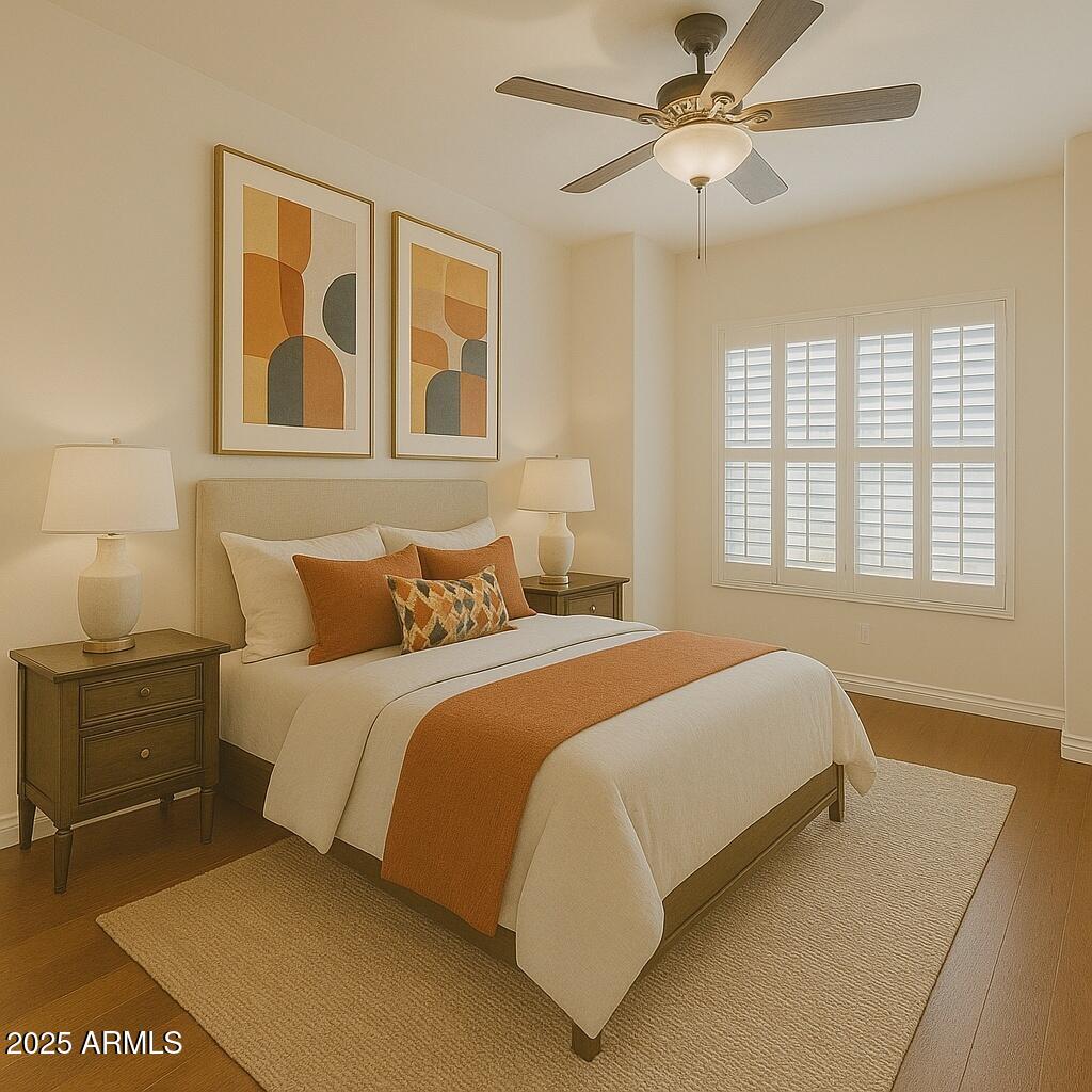 5450 East Deer Valley Drive, Unit 1208 Phoenix, AZ 85054 - Photo 18 of 36 a bedroom with a bed and a painting on the wall