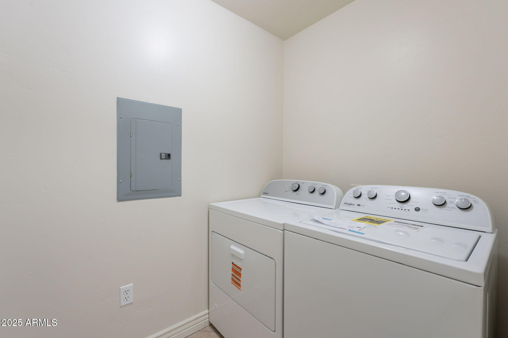 5450 East Deer Valley Drive, Unit 1208 Phoenix, AZ 85054 - Photo 22 of 36 a utility room with dryer and washer