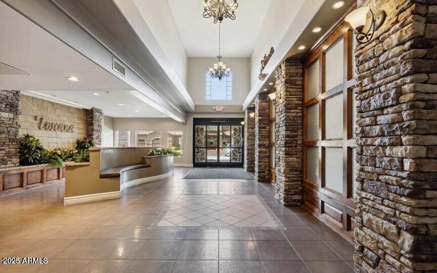 5450 East Deer Valley Drive, Unit 1208 Phoenix, AZ 85054 - Photo 36 of 36 a lobby with furniture and window