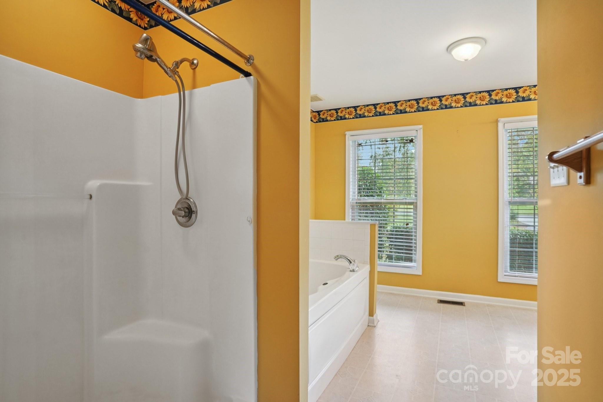 325 North Moose Road Mount Pleasant, NC 28124 - Photo 18 of 28 a bathroom with a shower and a tub