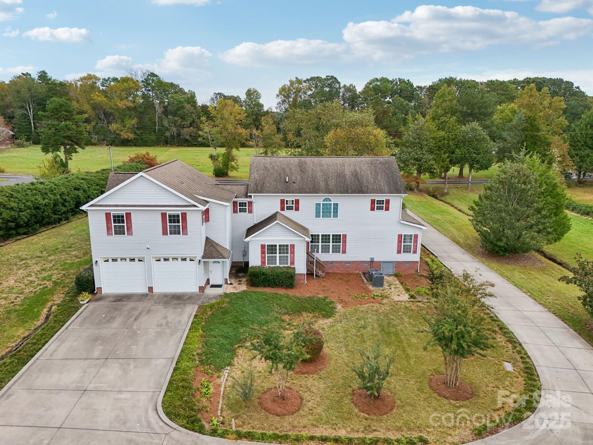 325 North Moose Road Mount Pleasant, NC 28124 - Photo 4 of 28 a aerial view of a house with a yard