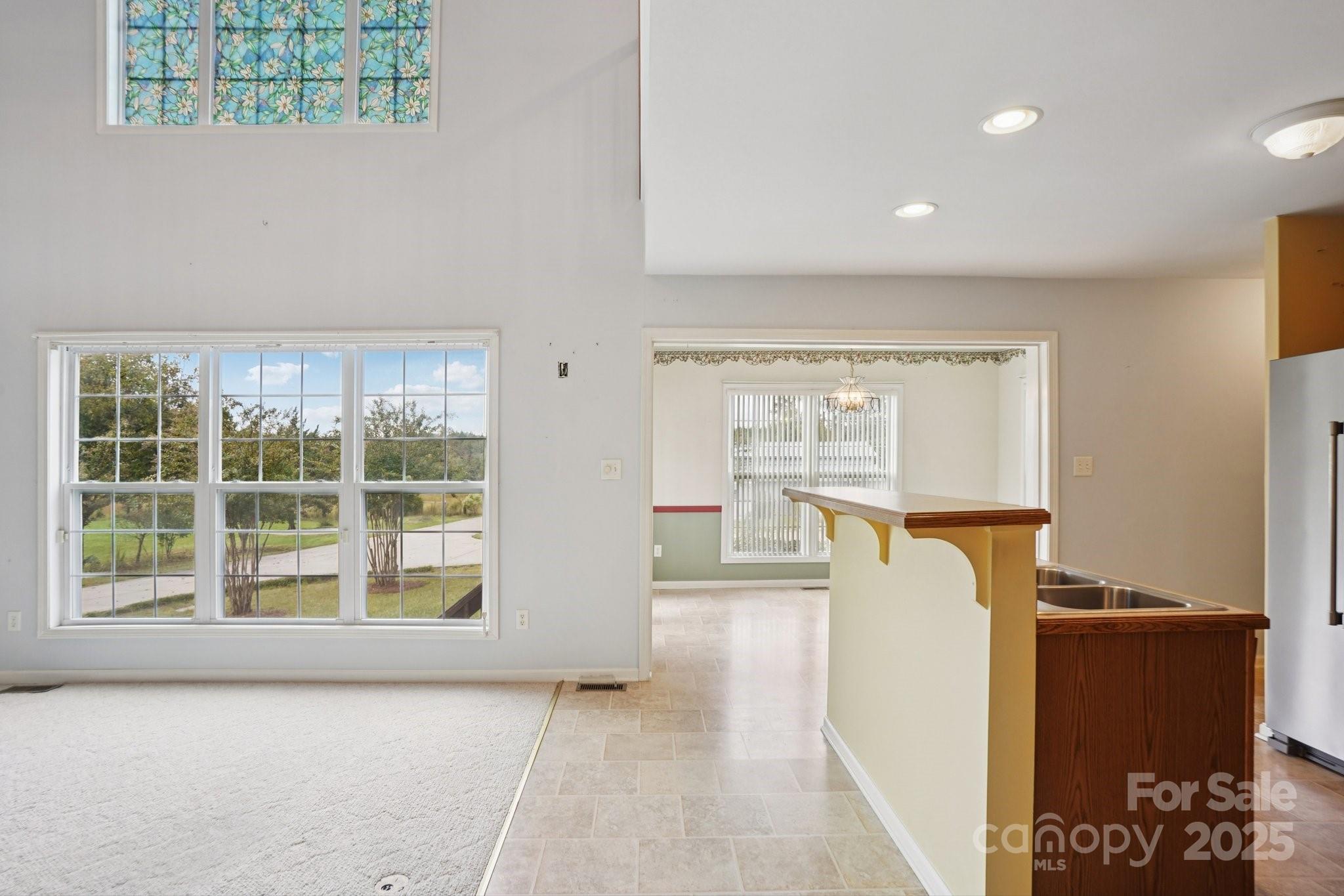 325 North Moose Road Mount Pleasant, NC 28124 - Photo 10 of 28 wooden floor in an empty room with a window