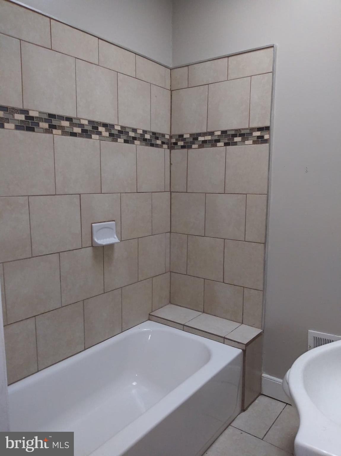 4528 Pimlico Road Baltimore, MD 21215 - Photo 5 of 20 Beautiful tiling in bathroom!