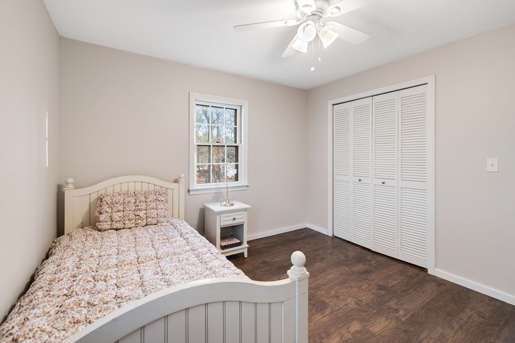 29 Butternut Circle Barnstable, MA 02635 - Photo 19 of 38 a bedroom with a bed and a window