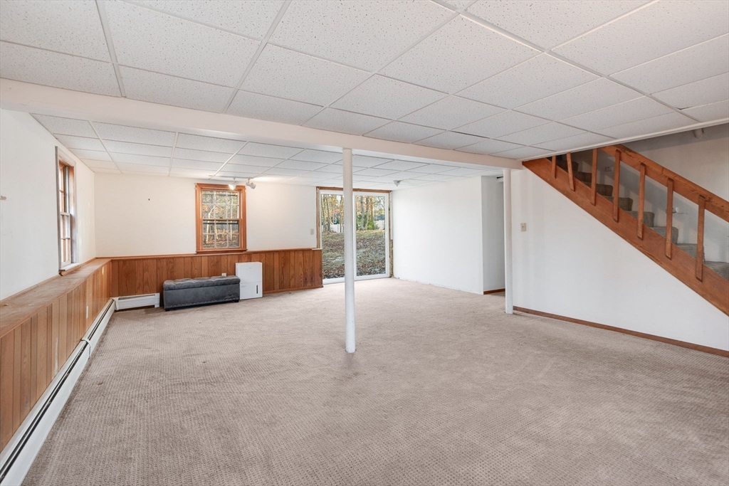 29 Butternut Circle Barnstable, MA 02635 - Photo 27 of 38 a view of a livingroom with furniture and staircase