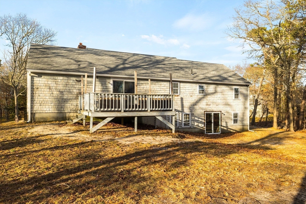 29 Butternut Circle Barnstable, MA 02635 - Photo 32 of 38 front view of a house with a patio