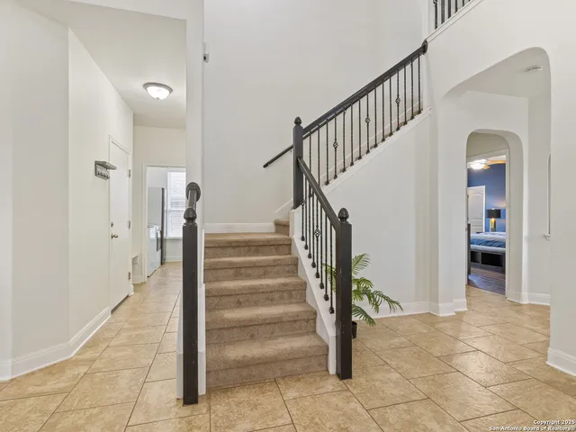 a view of an entryway with a front door