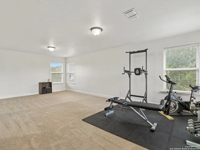 a view of a room with gym equipment