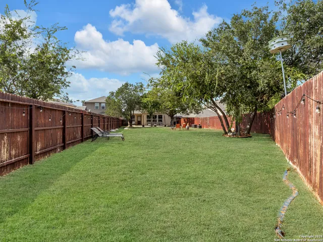 a view of a backyard with a garden