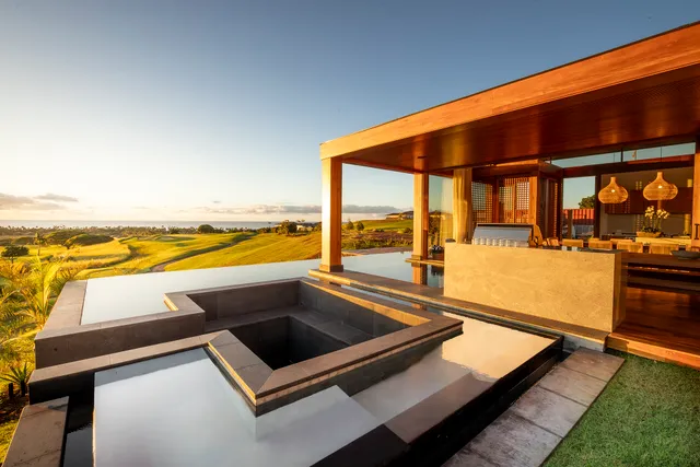 a view of swimming pool with outdoor seating