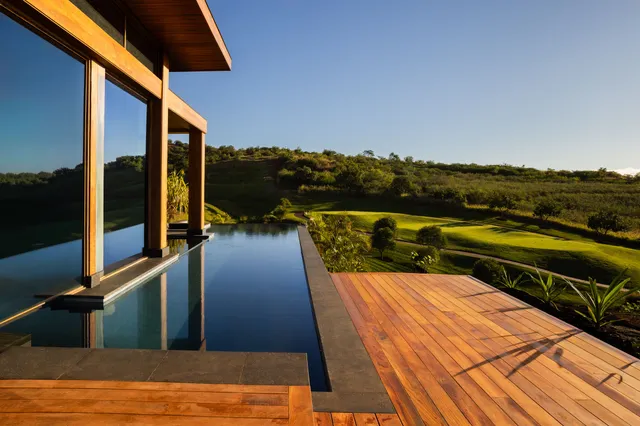 a view of balcony with furniture