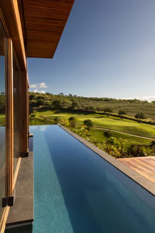 a view of swimming pool with outdoor space and seating area