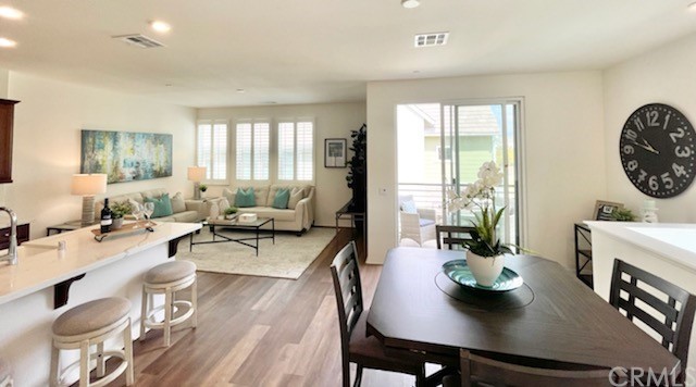 27 Concepcion Street Rancho Mission Viejo, CA 92694 - Photo 1 of 1 a living room with furniture and wooden floor