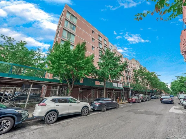 a view of car parked in front of house