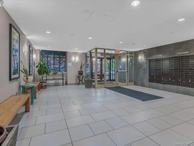 a view of a hall with chairs