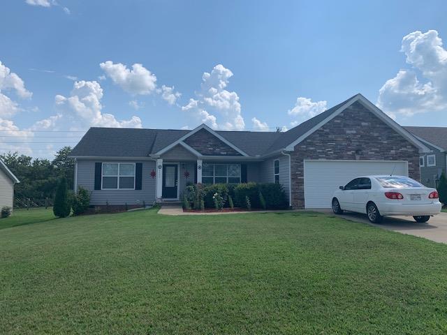 1136 Wrights Mill Road Spring Hill, TN 37174 - Photo 1 of 19 a front view of a house with a garden