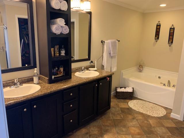 1136 Wrights Mill Road Spring Hill, TN 37174 - Photo 11 of 19 a bathroom with a granite countertop sink and a mirror
