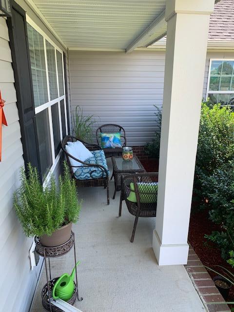 1136 Wrights Mill Road Spring Hill, TN 37174 - Photo 16 of 19 a chair and table in a backyard