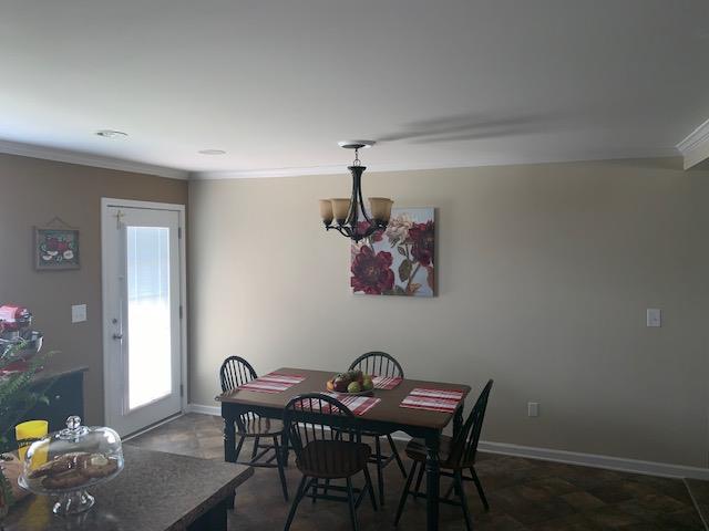 1136 Wrights Mill Road Spring Hill, TN 37174 - Photo 3 of 19 a view of a dining room with furniture and wooden floor