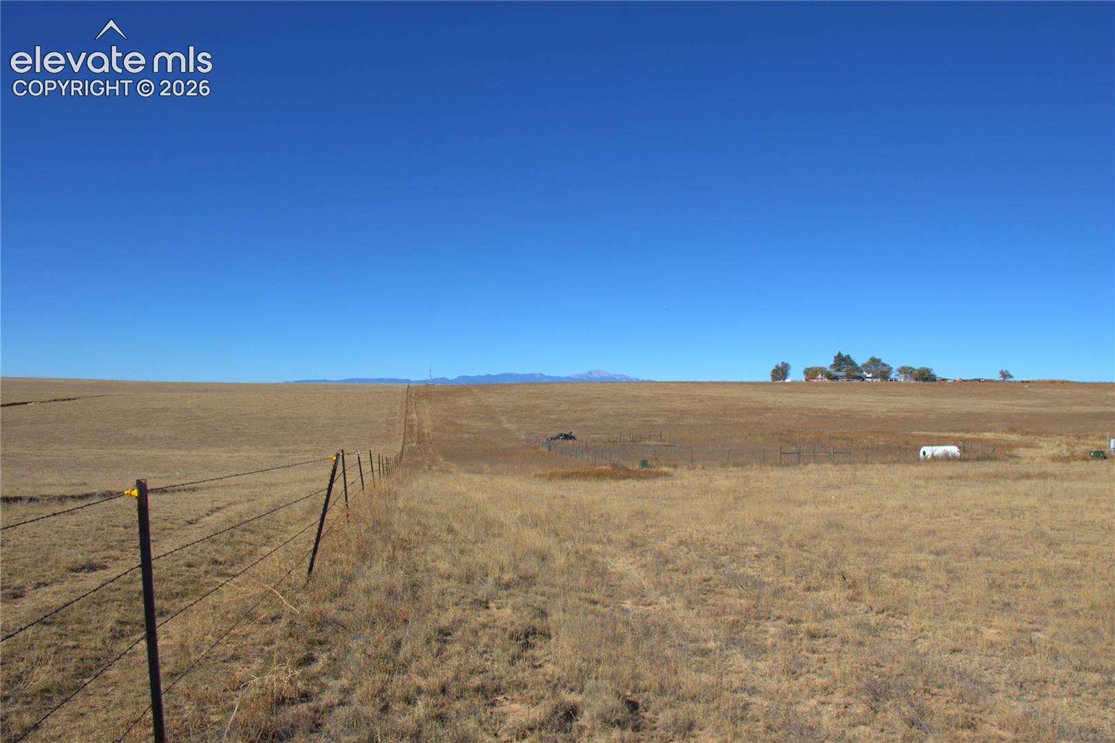 35520 Bowen Road Yoder, CO 80864 - Photo 15 of 21 View of yard with a view of rural / pastoral area and a mountain view