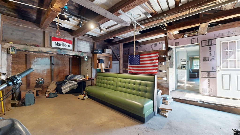 970 North Main Street Raynham, MA 02767 - Photo 11 of 42 a yellow and red sign sitting in front of a building