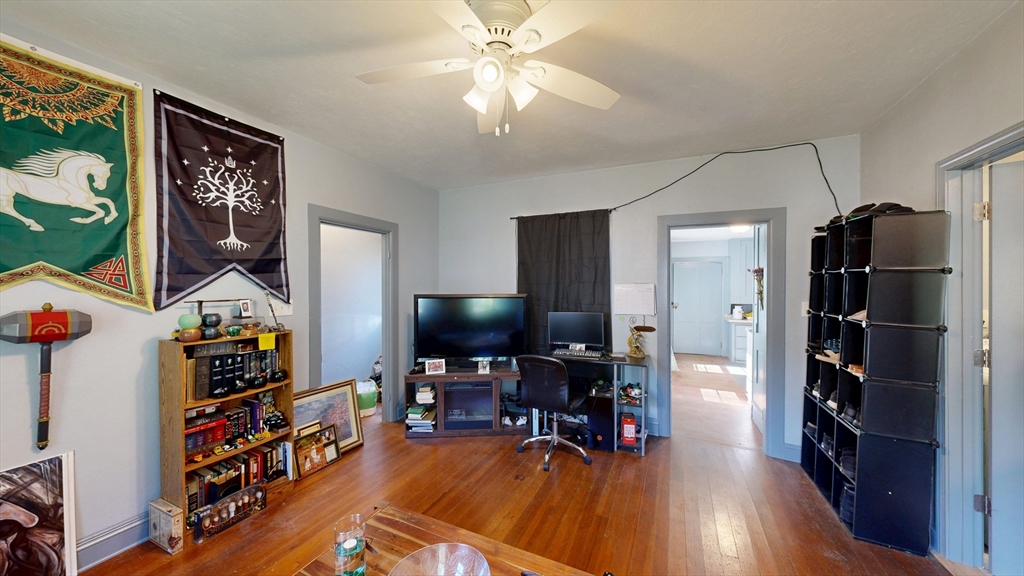 970 North Main Street Raynham, MA 02767 - Photo 15 of 42 a view of a livingroom with furniture and a flat screen tv
