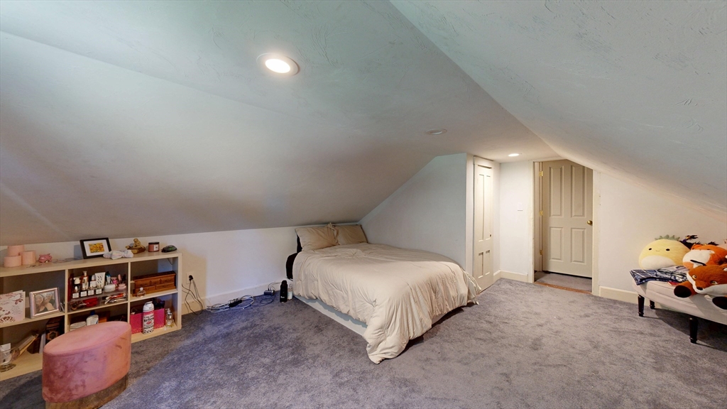 970 North Main Street Raynham, MA 02767 - Photo 17 of 42 a spacious bedroom with a bed and a desk