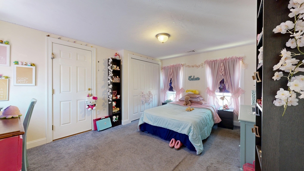 970 North Main Street Raynham, MA 02767 - Photo 27 of 42 a bedroom with bed and a window