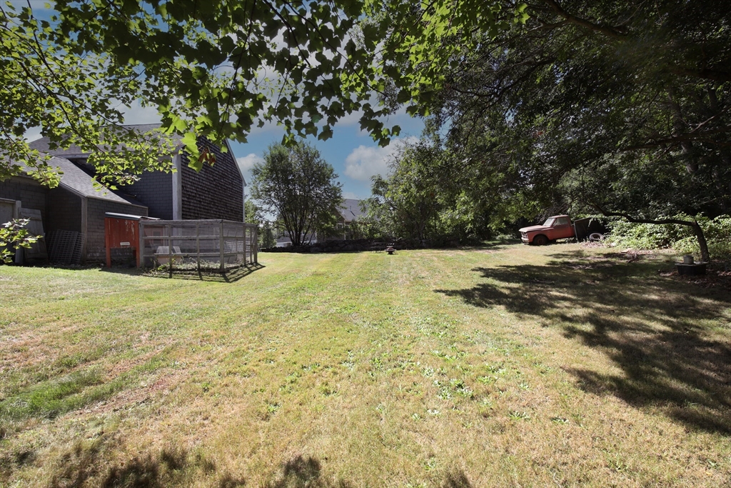 970 North Main Street Raynham, MA 02767 - Photo 30 of 42 a view of a backyard with large trees