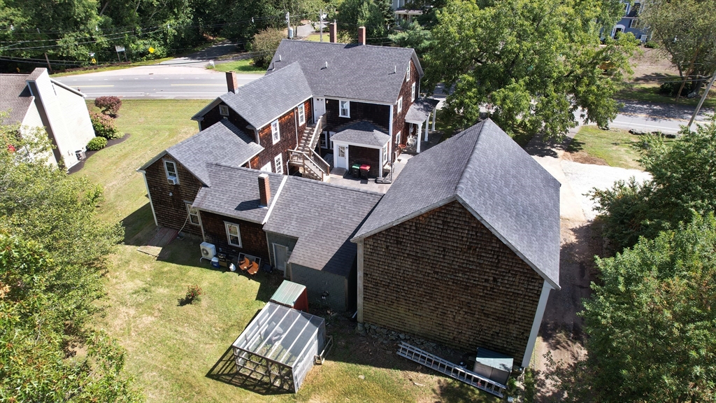 970 North Main Street Raynham, MA 02767 - Photo 39 of 42 an aerial view of a house with swimming pool and sitting area