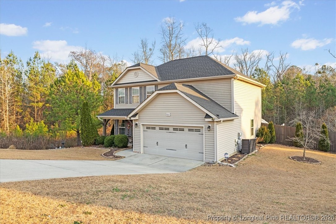 681 New Castle Lane Spring Lake, NC 28390 - Photo 2 of 50 front view of a house with a yard