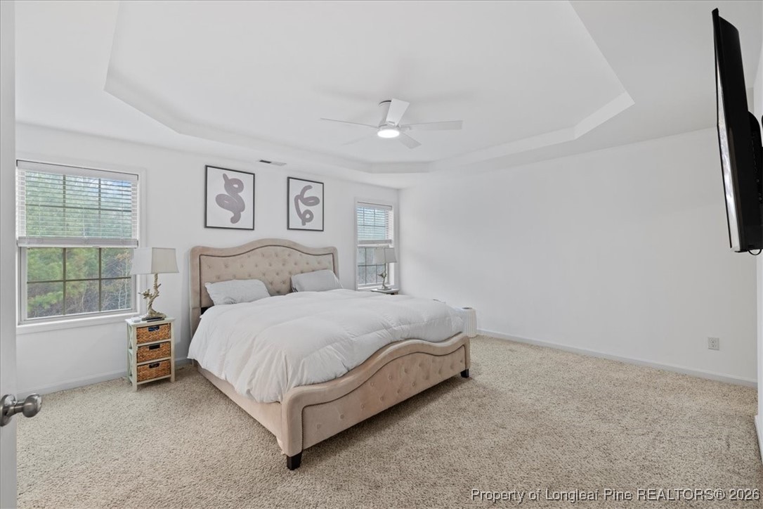 681 New Castle Lane Spring Lake, NC 28390 - Photo 26 of 50 a spacious bedroom with a bed and a window