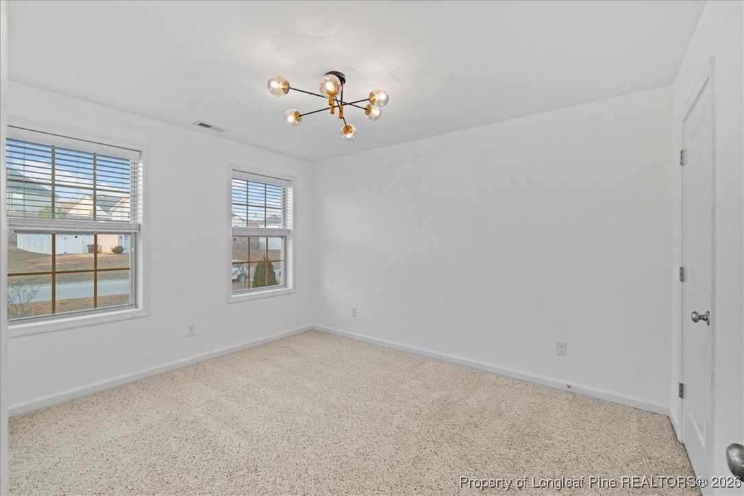 681 New Castle Lane Spring Lake, NC 28390 - Photo 38 of 50 a view of an empty room with a window