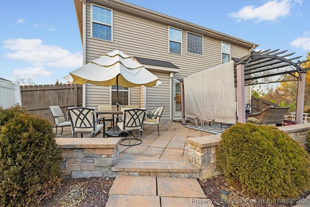 681 New Castle Lane Spring Lake, NC 28390 - Photo 46 of 50 a view of a chairs and table in the patio