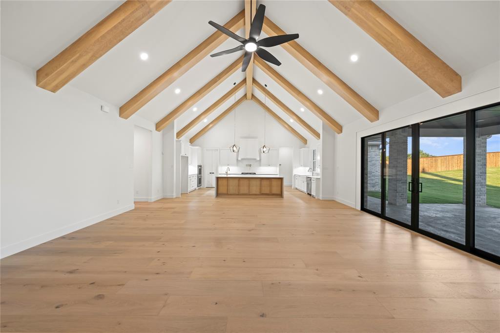 108 Bel Grand Road Haslet, TX 76052 - Photo 19 of 36 Vaulted ceiling with exposed wood beams and recessed lighting