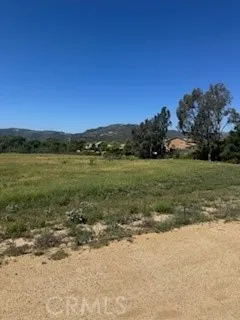 a view of a lake with a yard