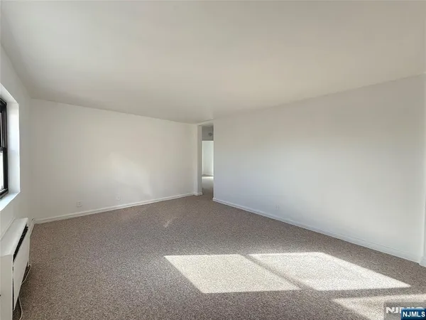 an empty room with a workbench