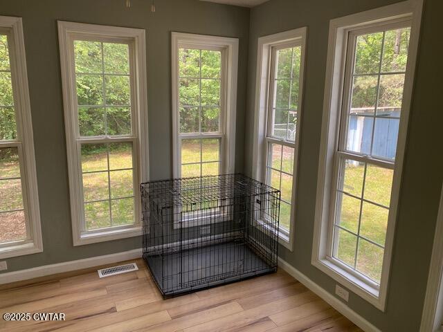 415 Mills Darden Road Lexington, TN 38351 - Photo 14 of 30 a view of porch with wooden floor and windows