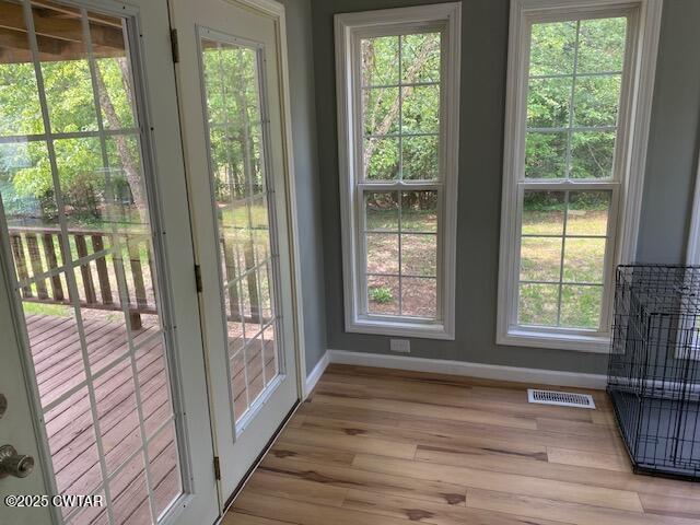 415 Mills Darden Road Lexington, TN 38351 - Photo 15 of 30 a view of an entryway with wooden floor and windows