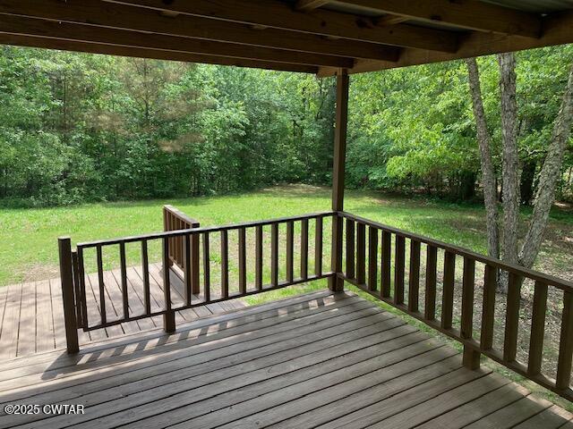 415 Mills Darden Road Lexington, TN 38351 - Photo 16 of 30 a view of a wooden deck