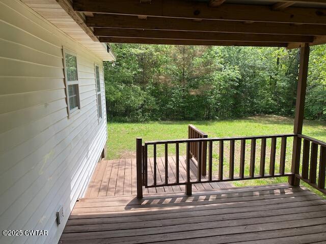 415 Mills Darden Road Lexington, TN 38351 - Photo 17 of 30 a view of balcony with wooden floor