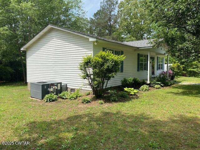 415 Mills Darden Road Lexington, TN 38351 - Photo 27 of 30 a front view of a house with a yard