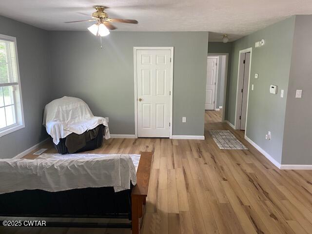 415 Mills Darden Road Lexington, TN 38351 - Photo 3 of 30 a bedroom with a bed and a window