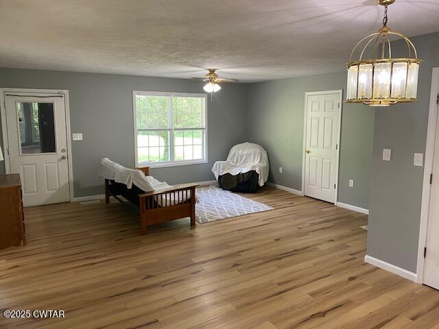 415 Mills Darden Road Lexington, TN 38351 - Photo 5 of 30 a spacious bedroom with a bed and wooden floor