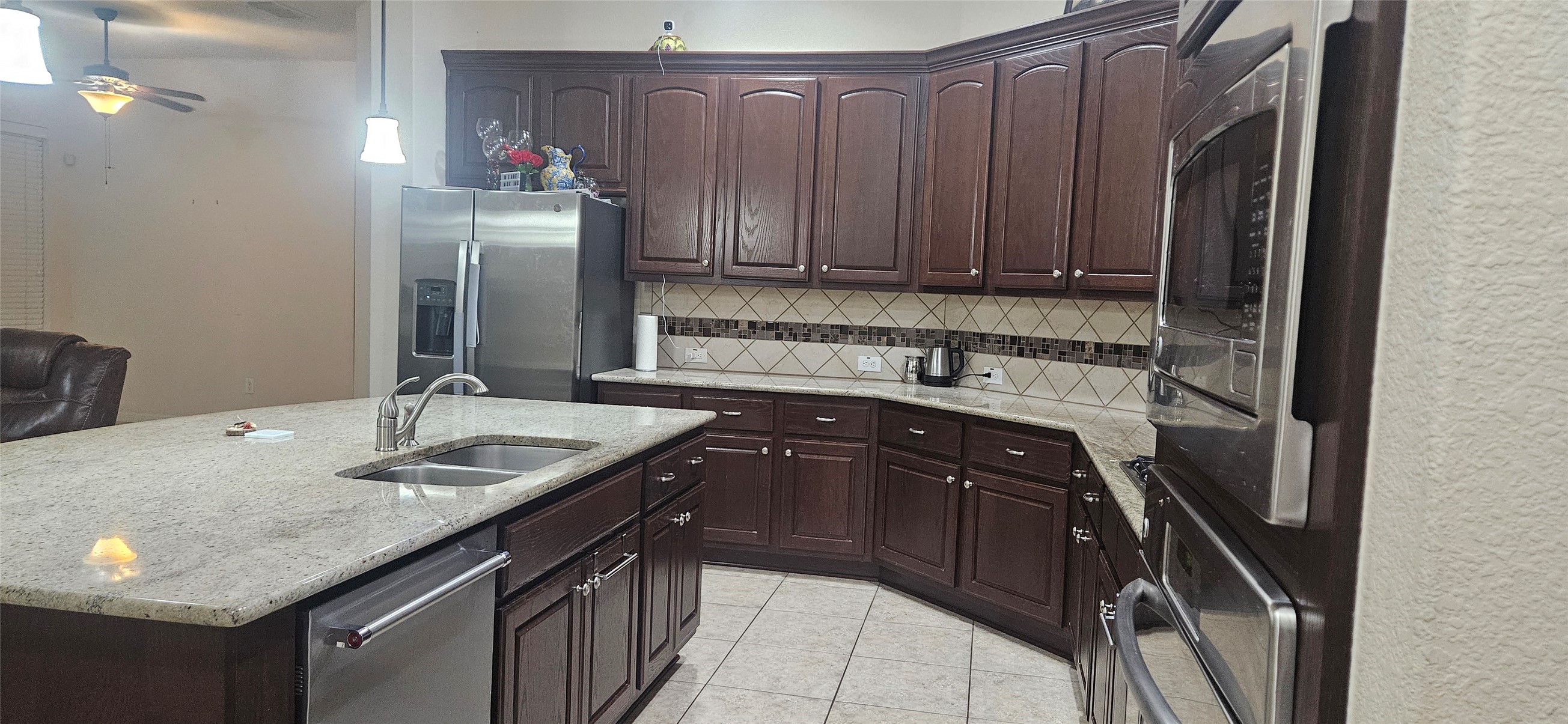 116 Azimuth Drive Austin, TX 78717 - Photo 23 of 33 a kitchen with a sink and cabinets