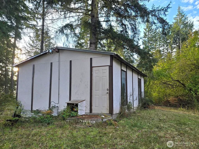 a fire hydrant in the middle of a field