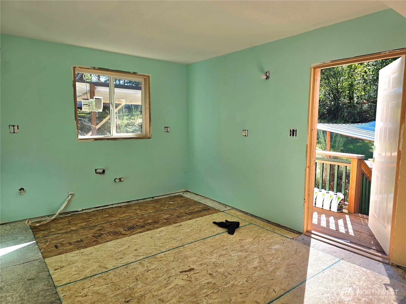 310 East Rauschert Road Grapeview, WA 98546 - Photo 6 of 11 a bedroom with a bed and a window